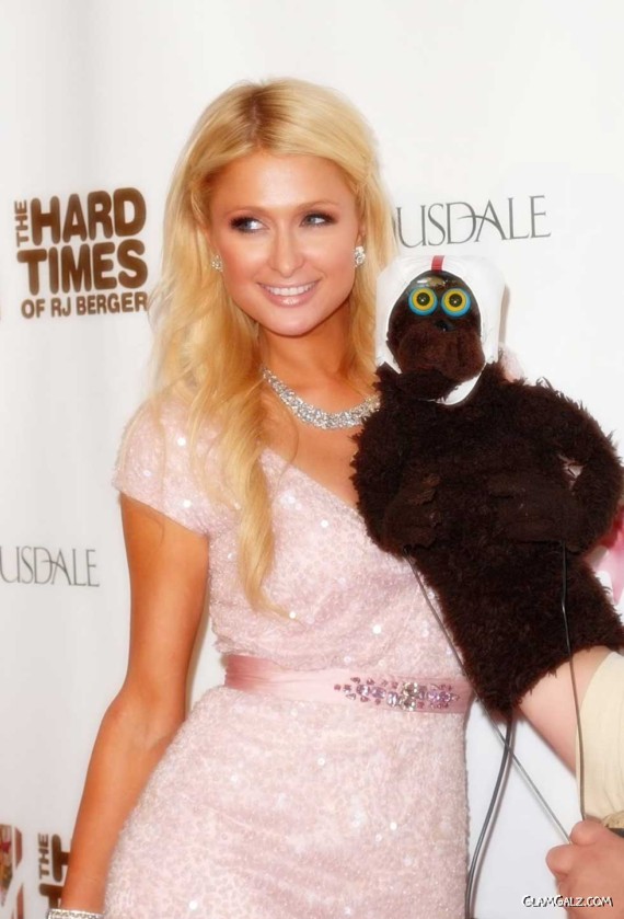 Paris Hilton Kisses a Monkey