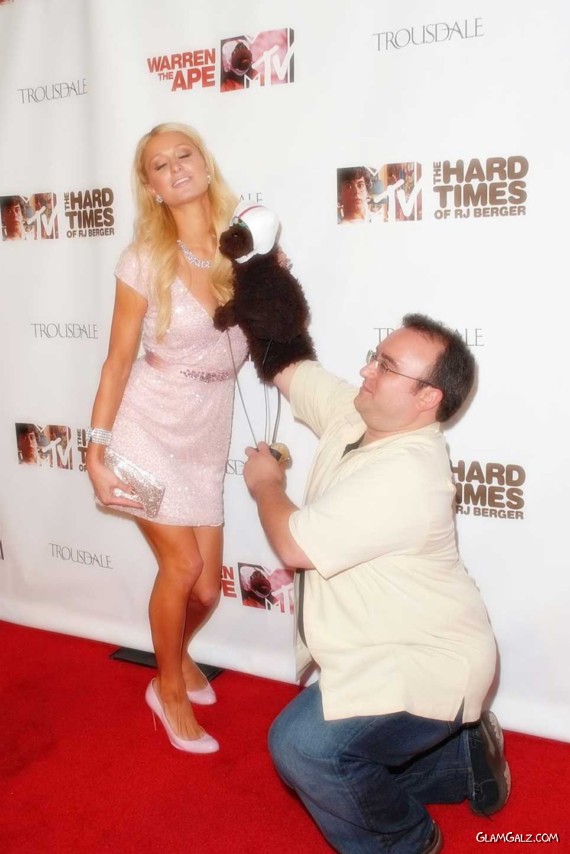 Paris Hilton Kisses a Monkey